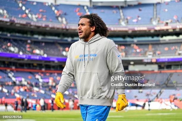 Linebacker Eric Kendricks of the Los Angeles Chargers warms up before a game against the Denver Broncos at Empower Field at Mile High on December 31,...