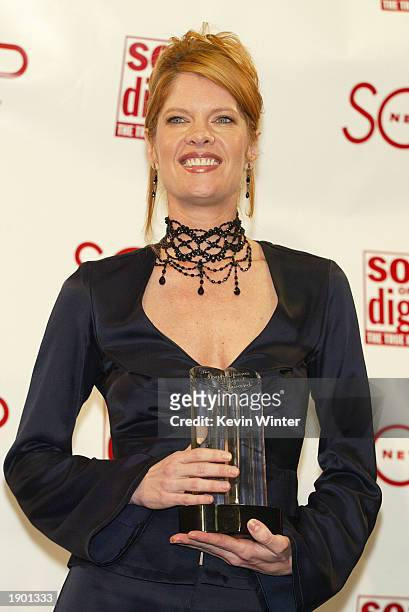 Actress Michelle Stafford poses with the Outstanding Lead Actress award at The Soap Opera Digest Awards presented by SOAPnet at the ABC Studios April...