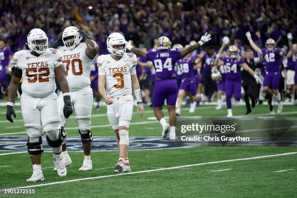 Quinn Ewers of the Texas Longhorns reacts after a 37-31 loss against the Washington Huskies in the CFP Semifinal Allstate Sugar Bowl at Caesars...