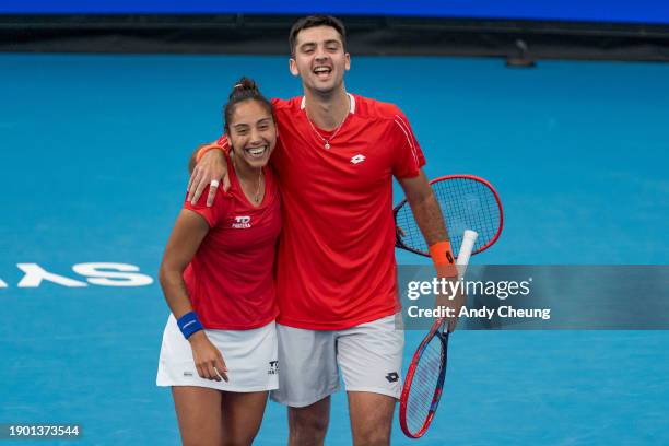 Tomas Barrios Vera and Daniela Seguel of Team Chile celebrate winning match point in the Group B doubles match against Maria Sakkari and Stefanos...