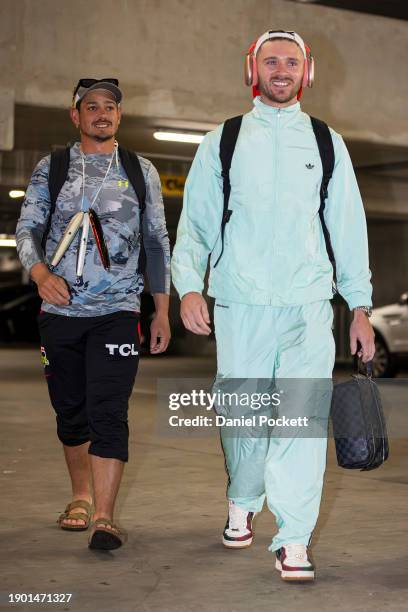 Quinton de Kock of the Renegades and Joe Clarke of the Renegades arrive during the BBL match between Melbourne Stars and Melbourne Renegades at...