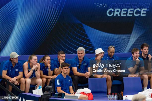 Members of Team Greece support Maria Sakkari and Stefanos Tsitsipas in the Group B doubles match against Tomas Barrios Vera and Daniela Seguel of...