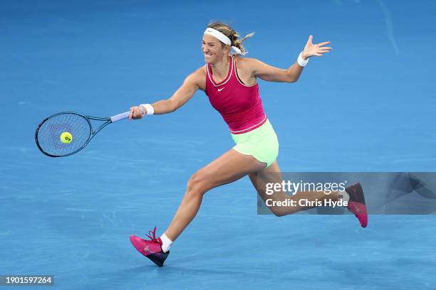 Victoria Azarenka of Belarus plays a forehand in her match against Anna Kalinskaya of Russia during day two of the 2024 Brisbane International at...