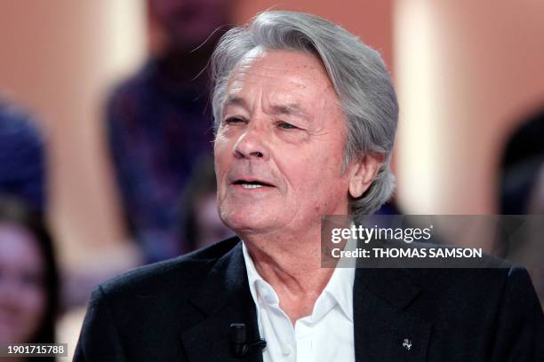 French actor Alain Delon, honorary president of the Miss France beauty contest, takes part in the TV show "Le Grand Journal" at the French TV Canal+...