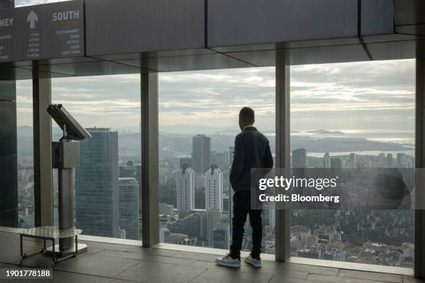 Visitor looks out towards the city skyline on the observation deck of the Istanbul Sapphire, in the Levent district of Istanbul, Turkey, on Thursday,...