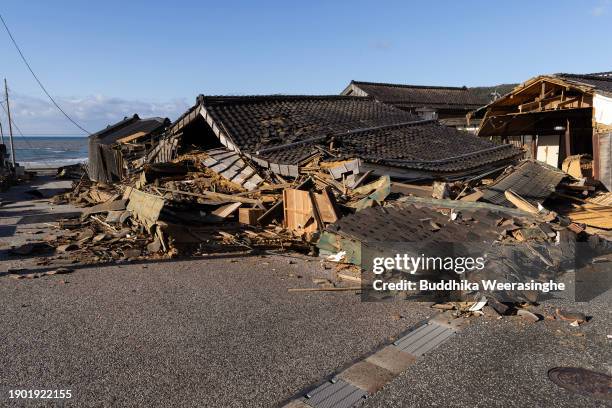 Houses damaged by earthquake are seen on January 02, 2024 in Wajima, Japan. A series of major earthquakes have reportedly killed at least 48 people,...