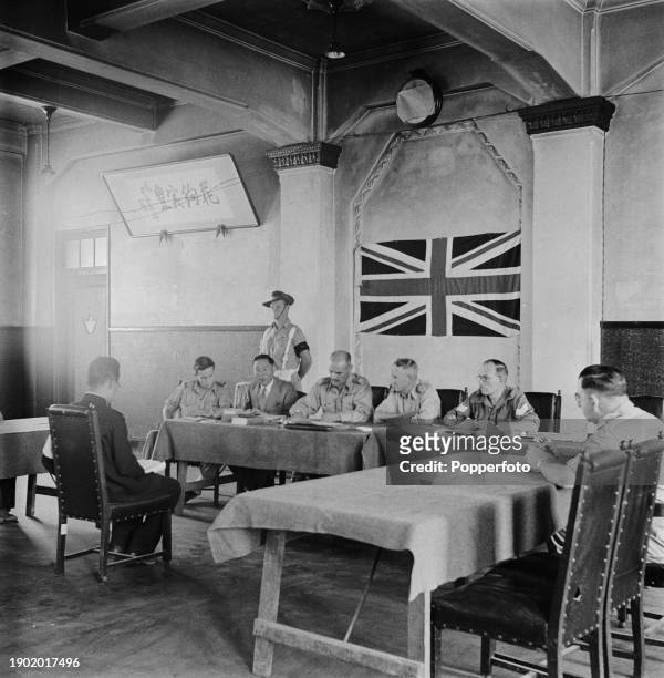 Japanese prisoner is charged by judges sitting in a British Commonwealth Occupation Force military court in occupied Japan on 17th July 1946. The...