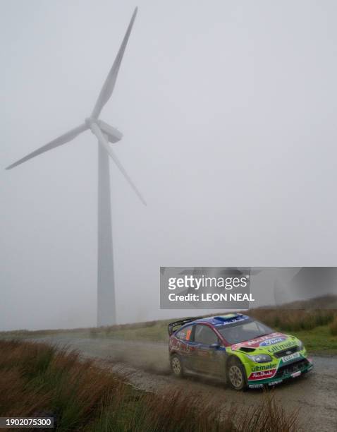 United Emirates' driver Khalid Al Qassimi drives his Ford Focus through the 'Myherin' stage on the second day of the Wales Rally GB in central Wales...