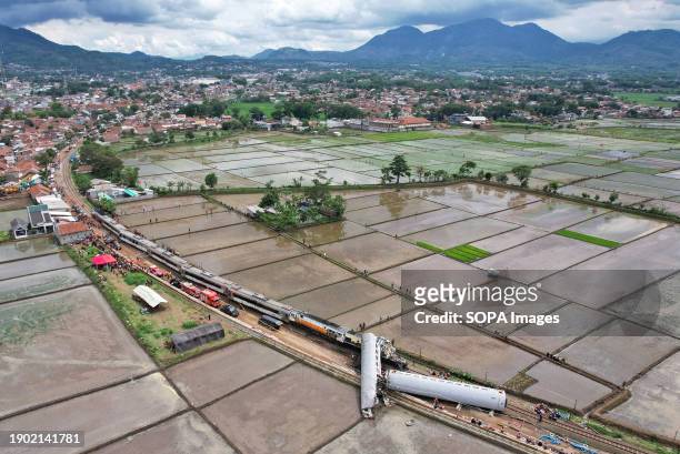 Aerial view of two trains after they collided in Cicalengka. Nearly 500 passengers were evacuated on Friday morning after two trains collided on the...