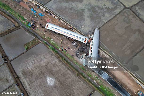 Aerial view of two trains after they collided in Cicalengka. Nearly 500 passengers were evacuated on Friday morning after two trains collided on the...