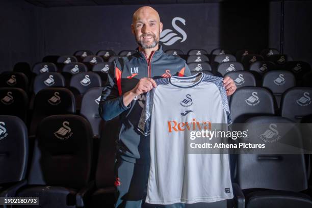 Luke Williams poses for a picture after signing a contract to become manager of Swansea City AFC at The Fairwood Training Ground on January 04, 2024...