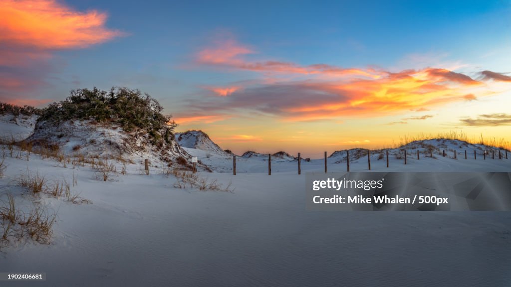 Scenic view of snow covered landscape against sky during sunset,Okaloosa Island,Florida,United States,USA