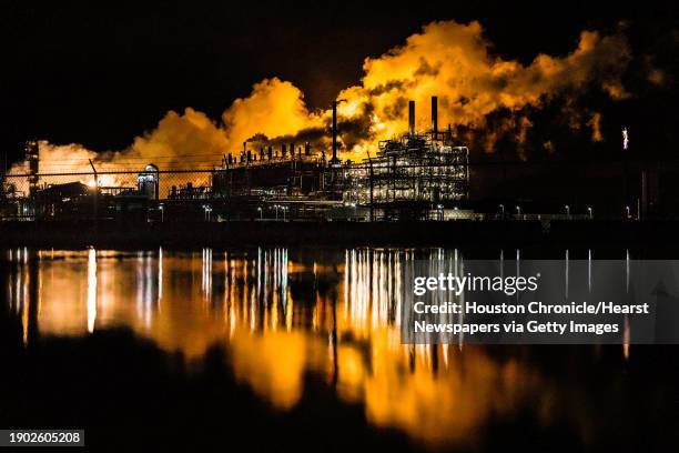 Black smoke and fire coming out of flared up plants after a tornado tore through southeast Houston on Sunday, Jan. 22, 2023 in Houston.