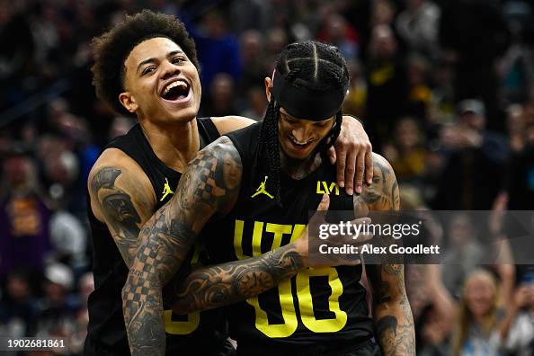 Keyonte Keyonte George of the Utah Jazz celebrates teammate Jordan Clarkson's ...