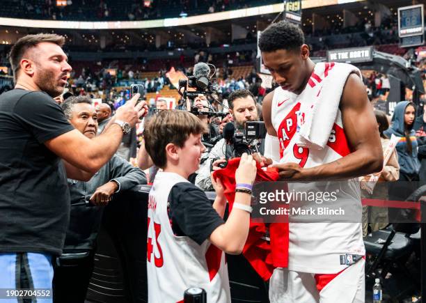 Barrett of the Toronto Raptors signs autographs after his team defeated the Cleveland Cavaliers in their basketball game at the Scotiabank Arena on...