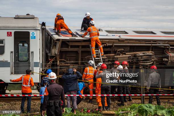 Search and rescue teams are searching for and evacuating victims after the Bandung Raya local train collided with the Turangga train in Cicalengka,...