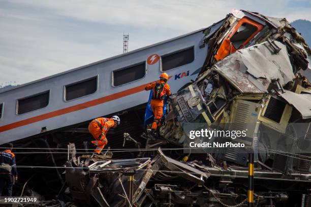 Search and rescue teams are searching for and evacuating victims after the Bandung Raya local train collided with the Turangga train in Cicalengka,...