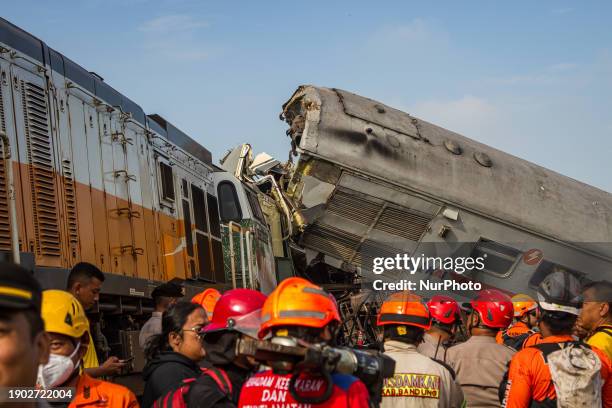 Search and rescue teams are searching for and evacuating victims after the Bandung Raya local train collided with the Turangga train in Cicalengka,...