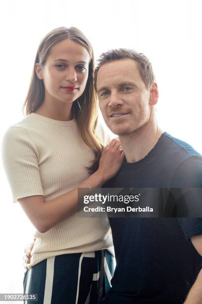 Actors Michael Fassbender and Alicia Vikander are photographed for New York Times on July 24, 2016 in New York City.