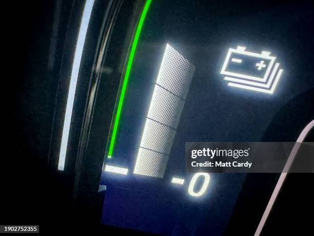 The battery level is shown on the dashboard of a self-generating hybrid EV, on January 01, 2024 in Bath, England. The government's commitment to...