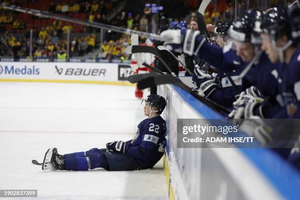 Finland's forward Kasper Halttunen reacts during the bronze medal match between Czech Republic and Finland of the IIHF World Junior Championship in...