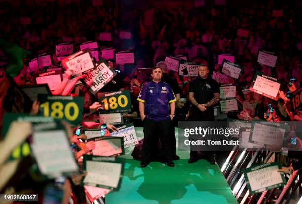 Luke Littler of England enters during his semi final match against Rob Cross of England on day 15 of the 2023/24 Paddy Power World Darts Championship...