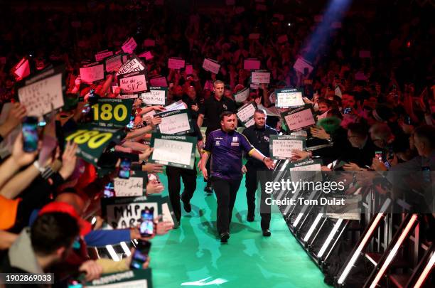 Luke Littler of England enters during his semi final match against Rob Cross of England on day 15 of the 2023/24 Paddy Power World Darts Championship...