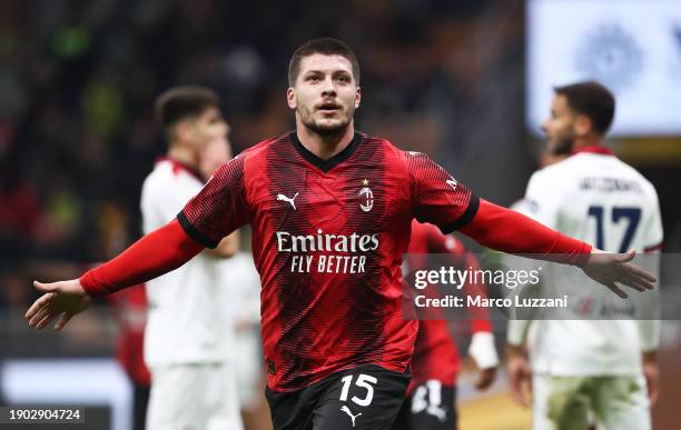 Luka Jovic of AC Milan celebrates after scoring their team's first goal during the Coppa Italia match between AC Milan and Cagliari Calcio at San...