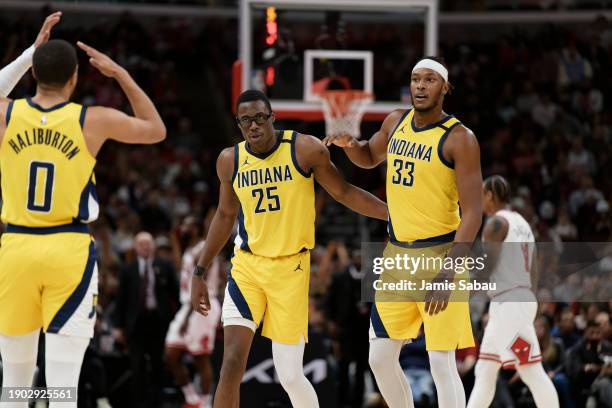 Jalen Smith and Myles Turner of the Indiana Pacers of the Indiana Pacers in action against the Chicago Bulls on December 28, 2023 at United Center in...