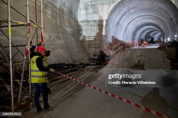 Workers at the tunnel under construction during Portuguese Prime Minister Antonio Costa visit with the Minister of the Environment and Climate Action...