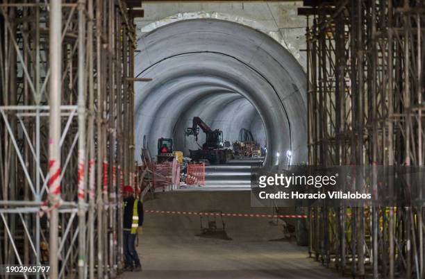 Workers are seen at the tunnel under construction during Portuguese Prime Minister Antonio Costa visit with the Minister of the Environment and...