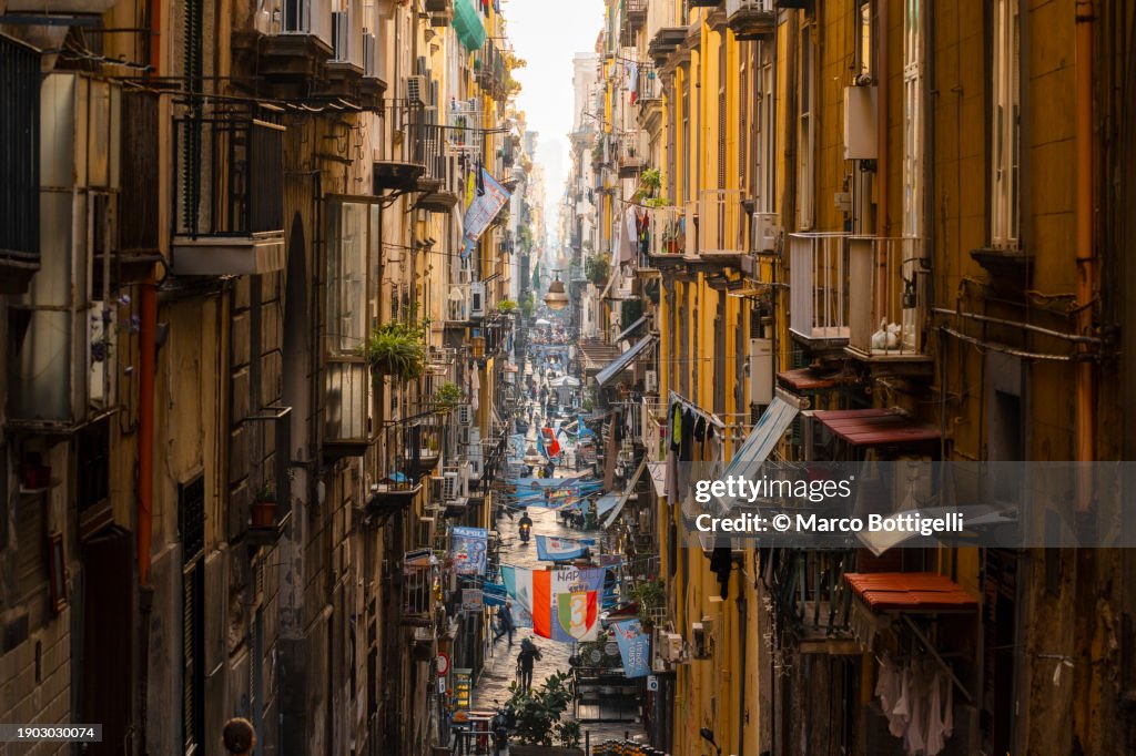 Narrow street in the old town of Naples, Italy