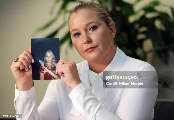 Virginia Roberts Giuffre, with a photo of herself as a teen, when she says she was abused by Jeffrey Epstein, Ghislaine Maxwell and Prince Andrew,...