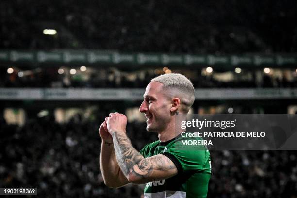 Sporting's Portuguese defender Nuno Santos celebrates after scoring during the Portuguese League football match between Sporting CP and GD Estoril...