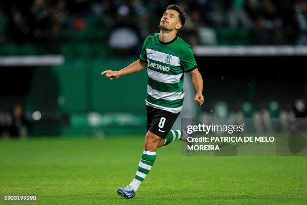 Sporting's Portuguese midfielder Pedro Goncalves celebrates after scoring during the Portuguese League football match between Sporting CP and GD...