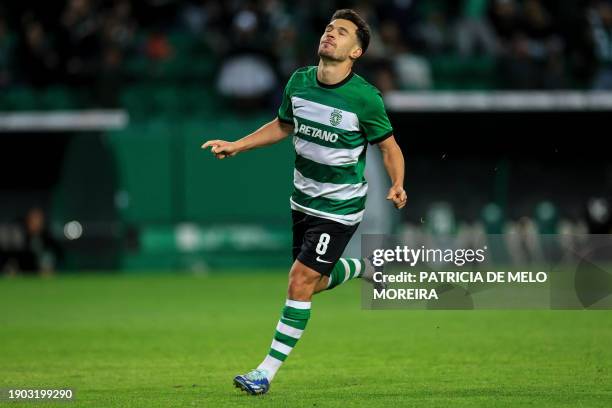 Sporting's Portuguese midfielder Pedro Goncalves celebrates after scoring during the Portuguese League football match between Sporting CP and GD...