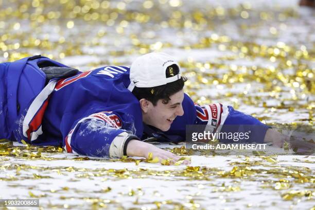 S defender Zeev Buium celebrates after USA wins the final ice hockey match between USA and Sweden of the IIHF World Junior Championship in...