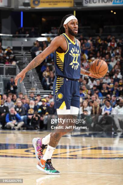 Isaiah Jackson of the Indiana Pacers dribbles the ball during the game against the Milwaukee Bucks on January 3, 2024 at Gainbridge Fieldhouse in...