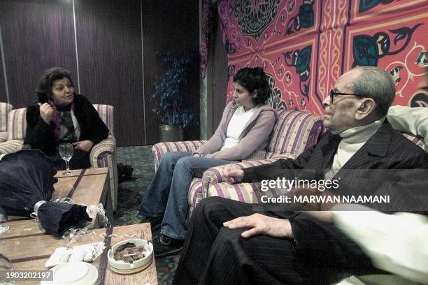 Egyptian novelist and the first Arab to be awarded Nobel prize Naguib Mahfouz celebrates his birthday party 13 December 2000 in Cairo. Mahfouz was...