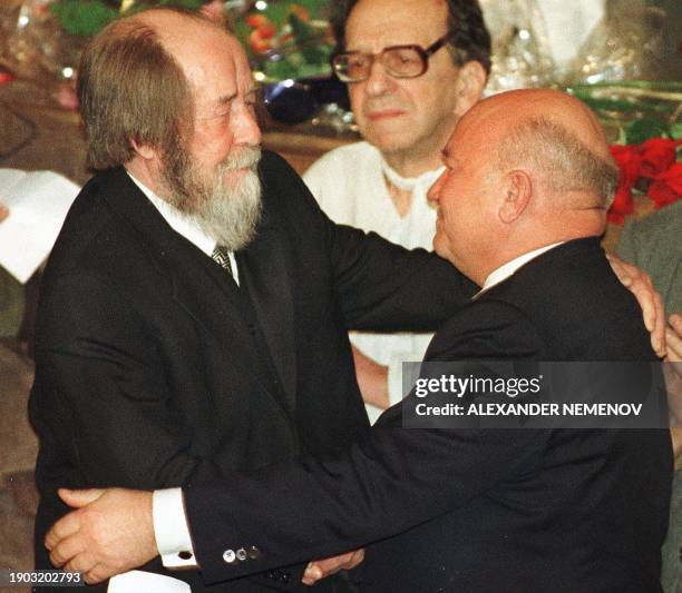 Celebrated Russian author and Nobel laureate Alexander Solzhenitsyn is congratulated by Moscow Mayor Yuri Luzhkov on the stage of the Theatre Na...