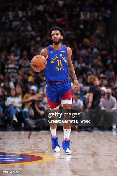 Braxton Key of the Denver Nuggets dribbles the ball during the game against the Orlando Magic on January 5, 2024 at the Ball Arena in Denver,...