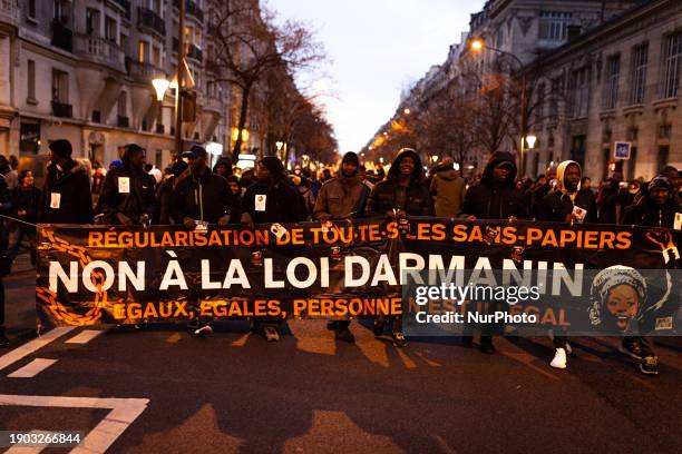 In Paris, France, on May 1 hundreds of people are participating in a demonstration against Interior Minister Gerald Darmanin's new immigration law,...