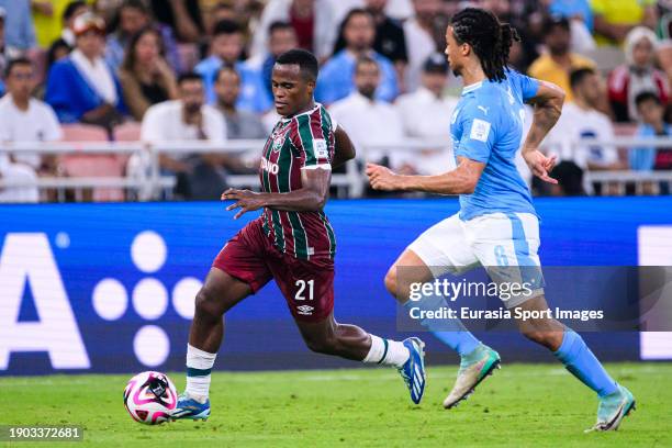 Jhon Arias of Fluminense is chased by Nathan Ake of Manchester City during the FIFA Club World Cup Final match between Manchester City and Fluminense...