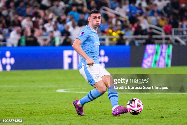 Phil Foden of Manchester City passes the ball during the FIFA Club World Cup Final match between Manchester City and Fluminense at King Abdullah...
