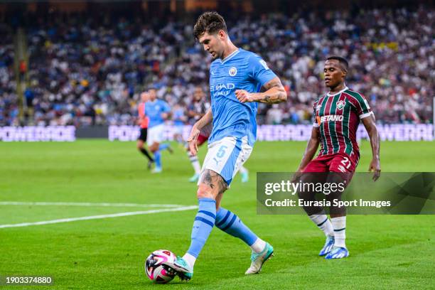 John Stones of Manchester City passes the ball during the FIFA Club World Cup Final match between Manchester City and Fluminense at King Abdullah...