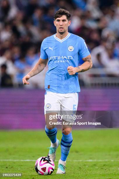 John Stones of Manchester City controls the ball during the FIFA Club World Cup Final match between Manchester City and Fluminense at King Abdullah...