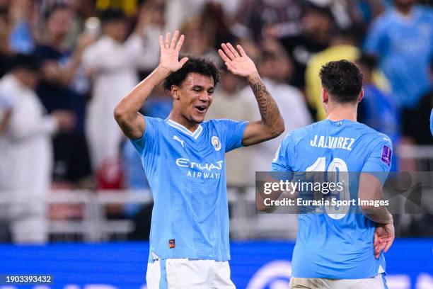 Julian Alvarez of Manchester City celebrates his goal with his teammate Oscar Bobb during the FIFA Club World Cup Final match between Manchester City...