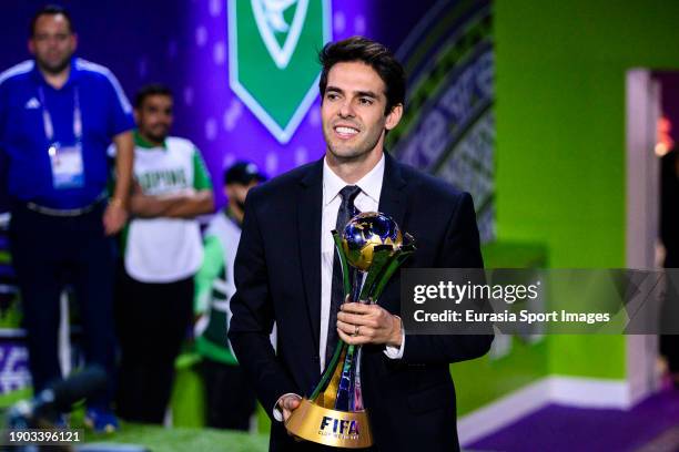 Former Brazilian football player Ricardo Leite Kaka introduces the FIFA Club World Cup trophy during the FIFA Club World Cup Final match between...