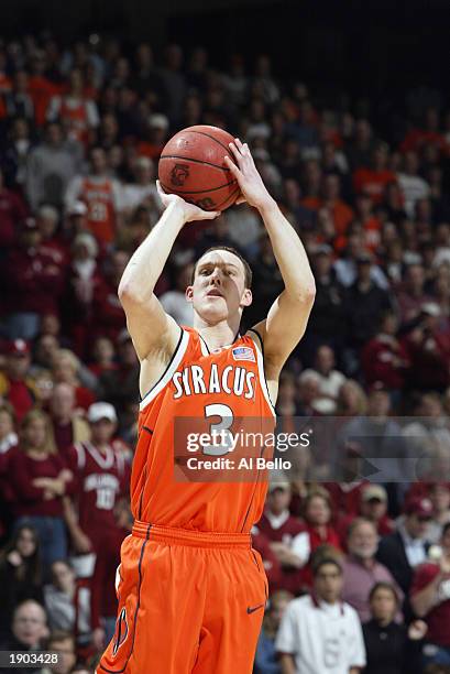 Gerry McNamara of the Syracuse Orangeman takes a shot against the Oklahoma Sooners during the NCAA Tournament on March 30, 2003 at the Pepsi Arena in...