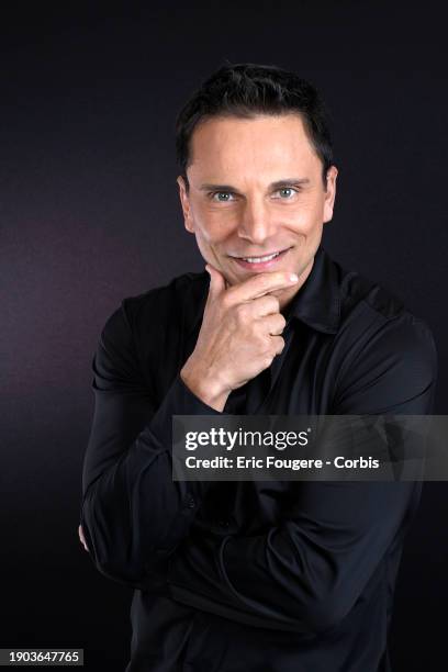 Singer Allan Theo poses during a portrait session in Paris, France on .